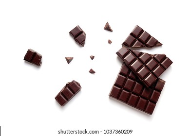 Chunks Of Dark Chocolate On White Background.