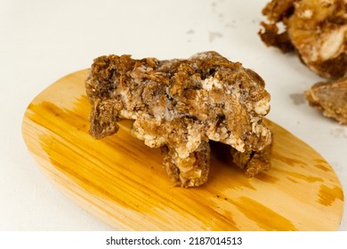 Chunks Of Half-cooked Beef Arranged On A Wooden Placemat