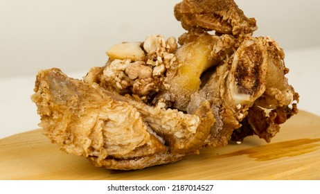 Chunks Of Half-cooked Beef Arranged On A Wooden Placemat