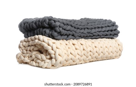 Chunky knit blankets folded on white background - Powered by Shutterstock