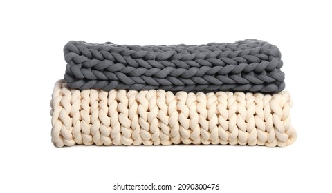 Chunky knit blankets folded on white background - Powered by Shutterstock