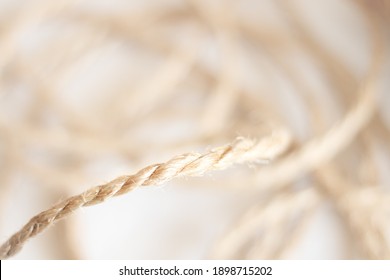 Chunky Twisted Sisal Yarn In Flat Detail Of A Rope Art Separated By Focal Difference From The Rest Of The Messy Yarn And Out Of Focus In The Background