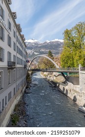 Chur, Switzerland, April 11, 2022 Modern Plessur Bridge With A Bow Over The Small River In The City Center