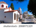 The church of Agios Nikolaos with the famous clock  Emblem of the island, Skiathos island, Greece