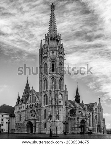 The Church of the Assumption of the Buda Castle, more commonly known as the Matthias Church in Budapest, Hungary, in black  white