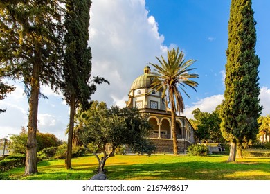 The Church of the Beatitudes is a Catholic church of the Italian Franciscan convent on the Mount of Beatitudes. Magnificent monastery surrounded by columns and slender tall palms and cypresses. 