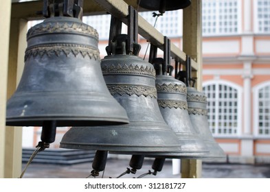 Church Bells Hanging In A Line