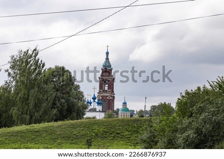 Church buildings tower in summer cloudy day