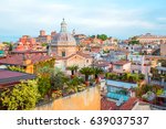 Church of Chiesa di santa maria ai mont and Rooftops of Rome - Panoramic view of the roofs of Rome, Italy 