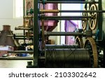 Church clockwork. The gear mechanism of a large old tower clock. Antique large clock mechanism with gears and cogs after restoration