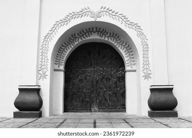 Church door entrance gates back and white