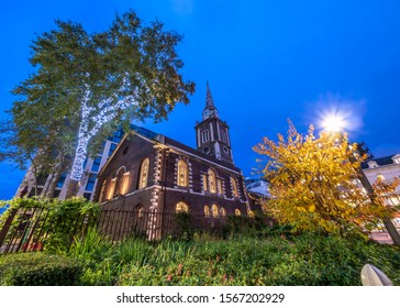 Church Of England In Aldgate Whitechapel Street Area At Dusk In Fall Season, England - United Kingdom