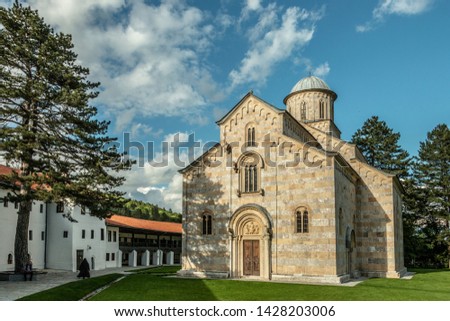 The church has five-nave naos, a three-part iconostasis, and a three-nave parvise. With the dome, it is 26 m high.[citation needed] Its outer walls are done in alternate layers of white and pink marbl [[stock_photo]] © 