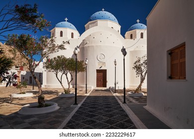 Church of the Holy Cross with a Blue Dome and an Huge Bell Tower - Perissa, Santorini, Greece - Powered by Shutterstock