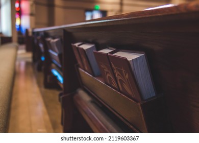 Church Hymnals In A Pew.