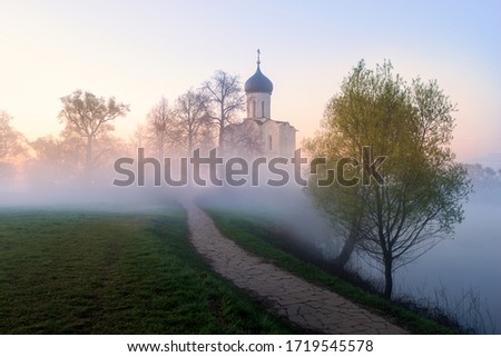 Church of Intercession of Holy Virgin on Nerl River in spring at sunrise, spring sunrise in Bogolyubovo, Russia