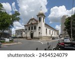Church on a corner in front of the square in the city of Mogi das Cruzes in Brazil