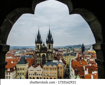 Church of Our Lady Before Tyn and Cityscape of Prague, seen through arches, Czech Republic, Europe.