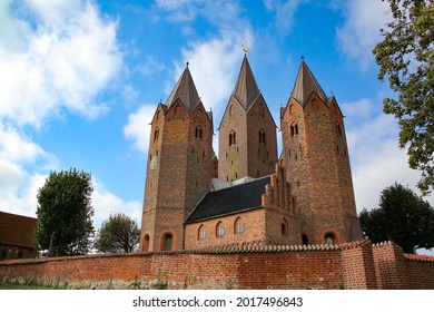 Church Of Our Lady In Kalundborg, Denmark. The Red Brick Church Has Five Distinctive Towers, And Stands On A Hill Making It The Town's Most Imposing Landmark. Surrounded By Walls And Gardens. 