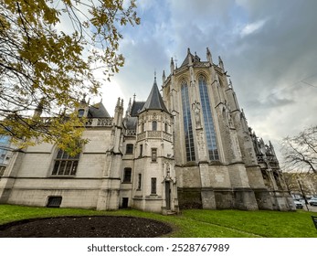 The church of our lady of victories at the sablon in Brussels, Belgium, is a stunning example of gothic architecture, featuring beautiful stained glass and rich historical significance. - Powered by Shutterstock