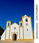 The church of the picturesque village of Praia da Luz in the Algarve was built in 1874 and is available for Catholic and Anglican weddings. Portugal.