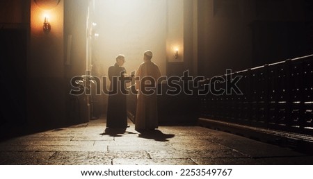 In The Church, A Priest And Pope Share A Conversation Of Faith, Reverence, And Hope, Connecting With Power Of Christianity, Discussing Gospels and Teachings of Jesus Christ and Holy Book ストックフォト © 