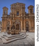 Church of Purgatory located in Marsala. Of Baroque inspiration, it was enlarged from 1601 and was completely renovated from 1669 to 1710, where the monumental fountain stands in the center