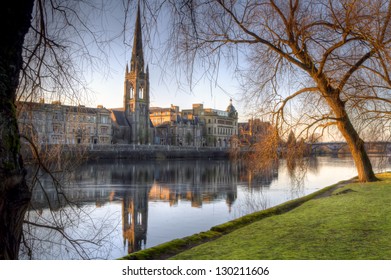 Church reflection on the river Tay in Scotland