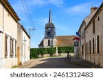 Church of Saint Germain in Nargis, a village of the French department of Loiret, Centre Val de Loire, France - Built in the 15th century it has a bell tower in a Dauphinois style