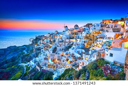 Church of Santorini. Fira town on Santorini island, Greece. Incredibly romantic sunset on Santorini. Oia village in the morning light. Amazing sunset view with white houses. Island of lovers. Postcard
