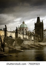 Church Of St Francis And Charles Bridge In Sepia, Prague