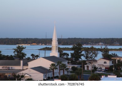 Church Steeple At Sunrise Along The Marina. Daytona Beach, FL.