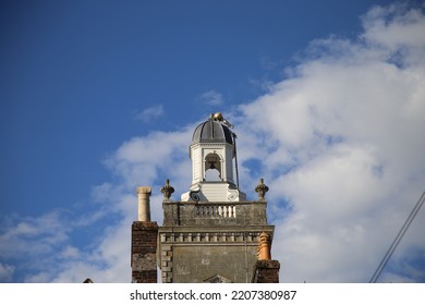 Church Tower With A Damaged Weather Vain