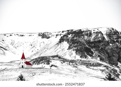 Church in Vik Iceland with red roof in a winter landscape. - Powered by Shutterstock