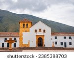 Church of Villa de Leyva with a person walking in front, Boyaca, Colombia