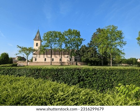 a church in a village in France. French church in the countryside. Place de la religion in France. Church of Sercy. Church of Burgundy