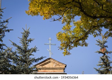 Church Wooden Cross And Autumn Trees