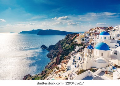 Churches in Oia, Santorini island in Greece, on a sunny day.