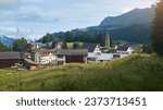 Churwalden village in Switzerland. Formerly Parpan. Beautiful swiss alpine countryside with a medieval bell tower. Place near Lenzerheide Pass at Grisons Alps in Graubunden canton.