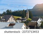 Churwalden village in Switzerland. Formerly Parpan. Beautiful swiss alpine countryside with a medieval bell tower. Place near Lenzerheide Pass at Grisons Alps in Graubunden canton.