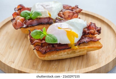 Ciabatta sandwich with poached egg and bacon