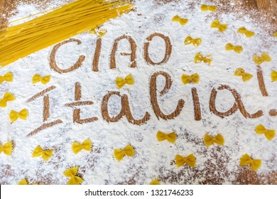 Ciao Italia Words Written On Table Composition With Flour And Pasta 