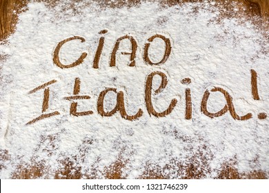 Ciao Italia Words Written On Table Composition With Flour And Pasta 