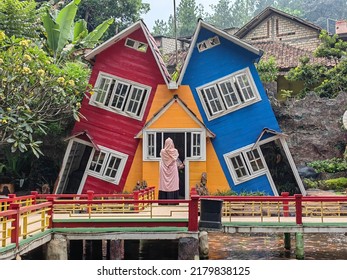 Ciawi, West Java, Indonesia - July 02 2022 : The Slanted House Building In The Tourist Location Of Chevilly Resort And Camp