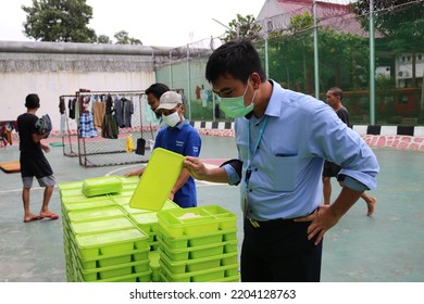 Cibinong, Bogor, Indonesia - 19 May 2021: An Officer Checks The Food Served For Prisoners