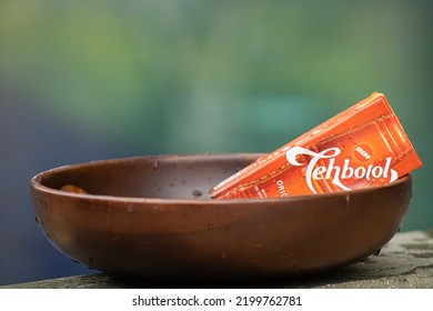 Cibubur, Indonesia, September 9, 2022 : Tea Box Sosro Placed In A Wooden Container