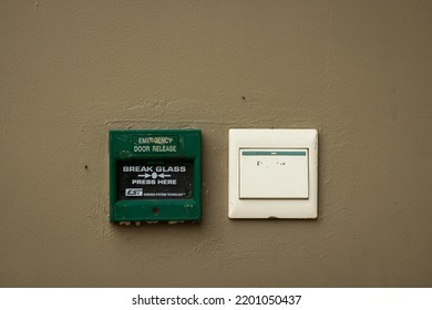 Cibubur, Indonesia, September 9, 2022: Emergency Door Button On One Wall Of The Apartment