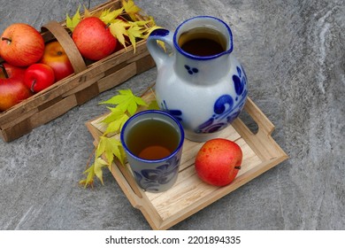 Cider In Traditional Blue Clay Jug.