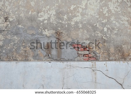 Similar – Background with plastered wall surface, bricks and wooden door