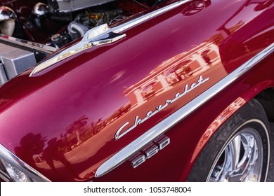 CIENFUEGOS, CUBA - MARCH 11, 2018 Red Chevrolet 350 Fitfyfive - 1955 Chevy Nomad Restomod. Detail.. Cuba